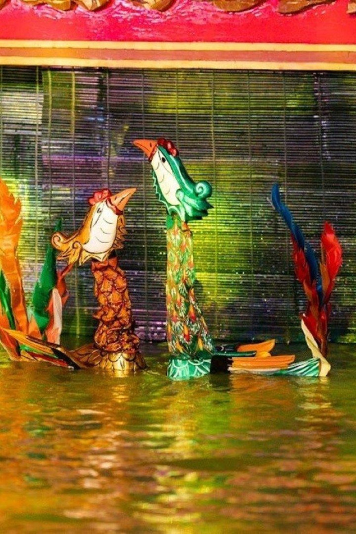 1 ROUND HANOI CITY TOUR + WATER PUPPET SHOW TICKET - Riding an open-top bus loop around Hanoi’s core sights