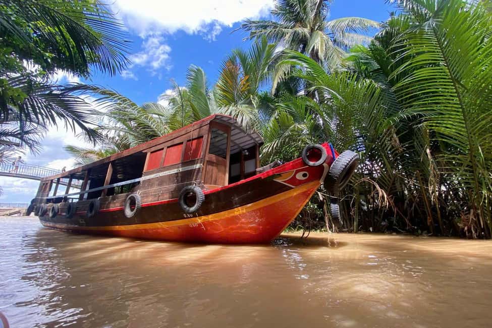 Authentic Mekong Delta: Tuk Tuk, Rowing Boat, Biking Tour - Vinh Trang Pagoda: architecture that frames the countryside day