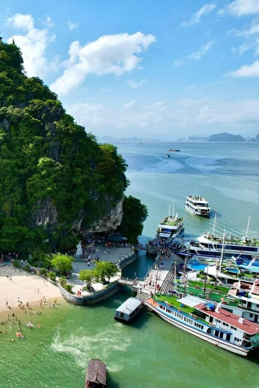 Best Price Ha Long Bay Day Trip with Kayaking and Cave Visit - Sunset on Tuan Chau: red wine and fruit while the day winds down