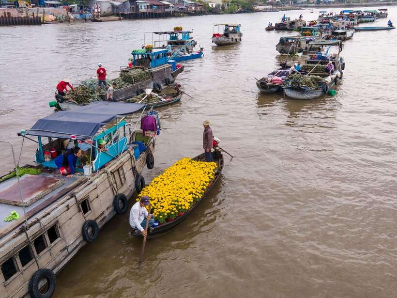 Can Tho: Explore Mekong, Floating Market, Cacao & Local Life - Beyond the headline boats: pineapple, local boat life, and fish/produce trading