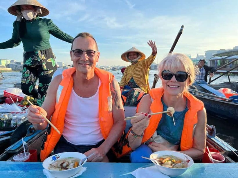 Can Tho: Floating Market, Cacao & Canals with French Guide - Wooden sampans and breakfast on the river