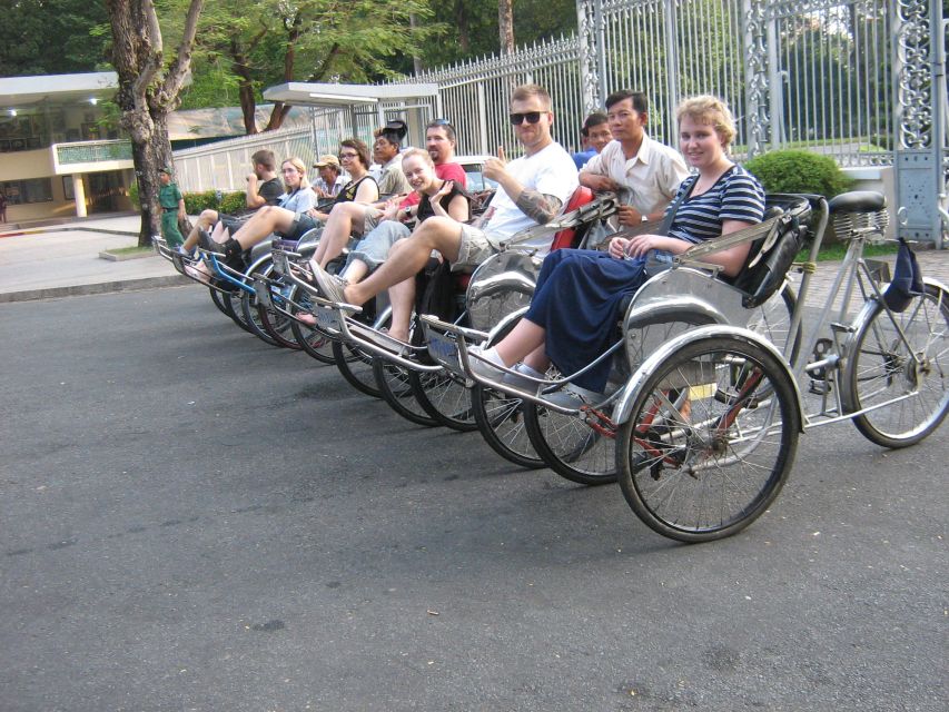 Customized Ho Chi Minh City Experience on Cyclo with Driver - Street-level moments: vendors, herbs, and family businesses