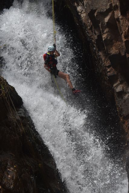 Dalat: Extreme Canyoning Adventure - The cliff sequence: dry abseil, wet waterfall, and the Washing Machine moment
