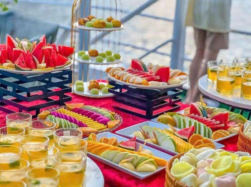 D'Charme Luxury Day Cruise Discover the Stunning Lan Ha Bay - Lunch on board: fresh seafood, local specialties, and portion reality