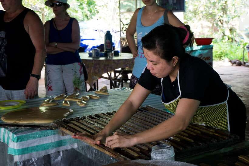 Essential Mekong Delta: Highlight Tour from Ho Chi Minh City - Cruising the Tien River: Four Islets and Fish Rafts Along Rach Mieu