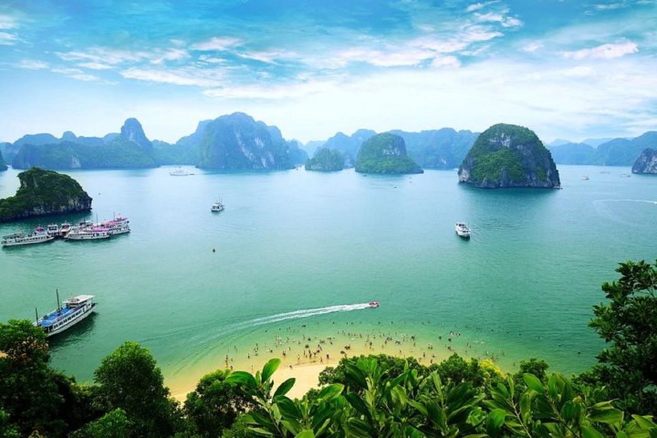 From Hanoi: 2-Day Ha Long Bay Tour with Ninh Binh and Cruise - Day 1 on Ha Long Bay: caves, kayaking, and Titop Island