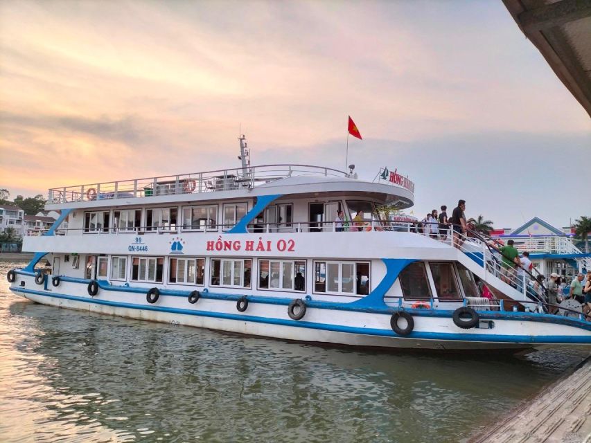 From Hanoi: Halong Bay Day Trip w/ Cave, Island & Kayak - Sunset Party on Board: Red Wine, Fruit, Cake, and Good Vibes