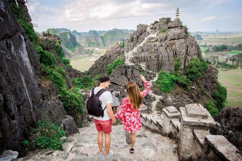 From Hanoi: Ninh Binh- Hoa Lu-Tam Coc- Mua Cave- Highlight - Mua Cave at 15:45: almost 500 steps to Lying Dragon Mountain