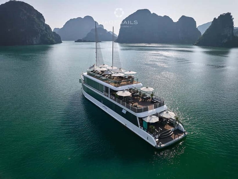 From Hanoi: Top-Rated Ha Long Bay Day Cruise with Jade Sails - Dark and Bright Cave: kayaking or bamboo boat on the tight timeline