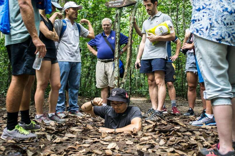 From HCM: Full-Day Cu Chi Tunnels & City Highlights Tour - Inside Củ Chi Tunnels: Survival Tactics You Can See