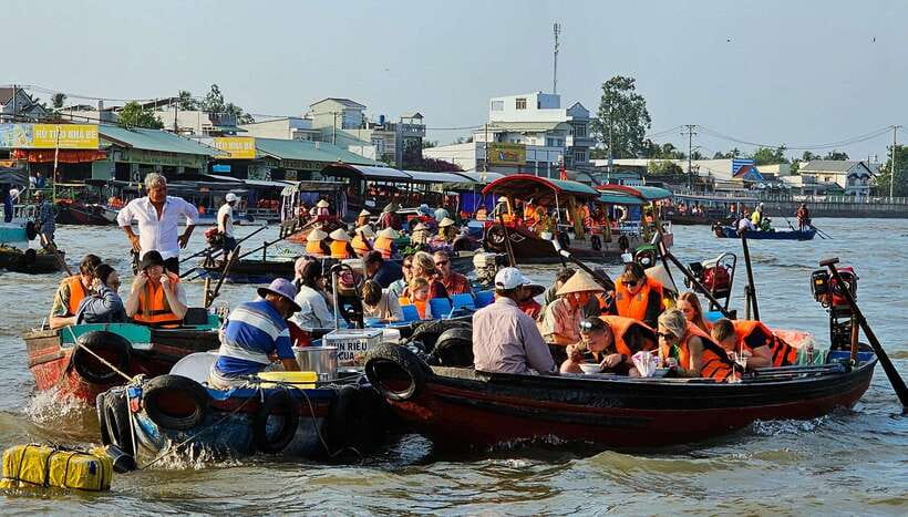 From HCM: Mekong Delta Can Tho Floating Market 2-Day Tour - Lunch, crocodile fishing, monkey bridge, and hammocks in the afternoon