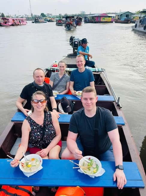 Vietnam Mekong Delta: 2-Day Cai Rang & River Adventure HCM - Day 1 on the Mekong: My Tho motorboat, fish cages, and hand-rowing creek time